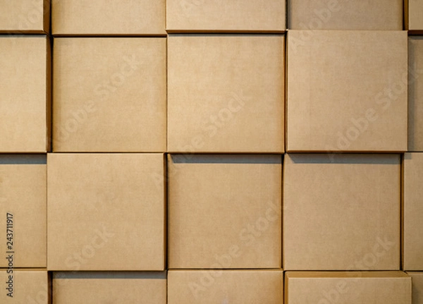 Fototapeta Cardboard blank boxes wall. Background