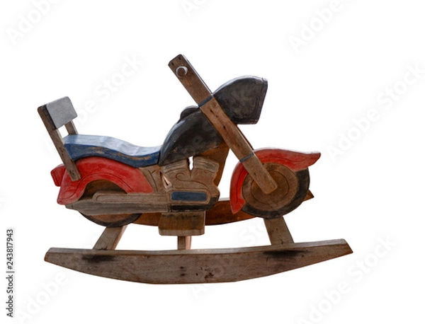 Fototapeta side view wooden colored rocking motorcycle on white background, copy space