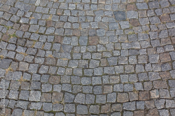 Fototapeta Abstract background of old cobblestone pavement in Prague, Czech Republic