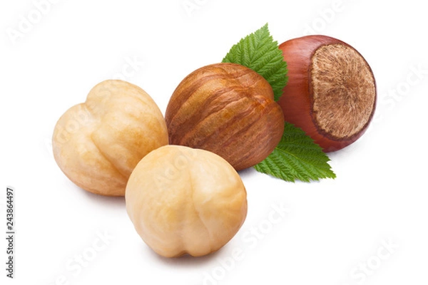 Fototapeta Hazelnuts with leaves, isolated on white background