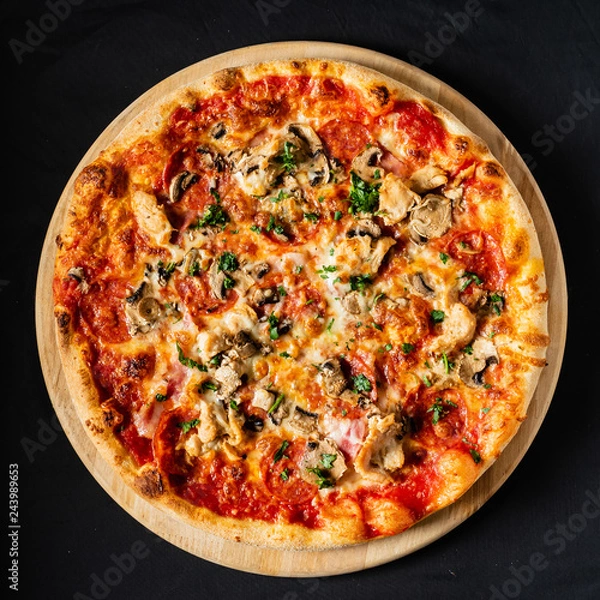 Fototapeta pizza on the black background
