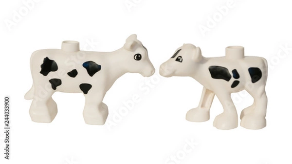 Fototapeta two cows plastic toys