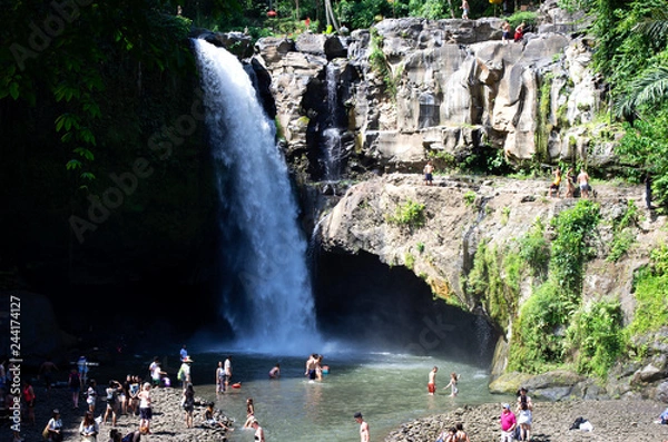 Obraz Bali / Indonesia - May 19 / 2017 : Tourists having fun at Blangsinga waterfall