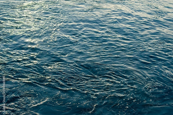 Fototapeta Blue and turquoise water with irregular wave structure