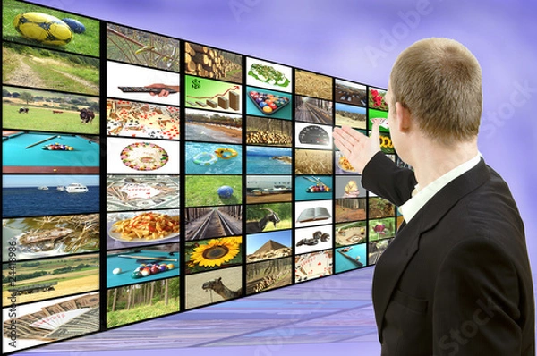 Obraz Businessman showing screen