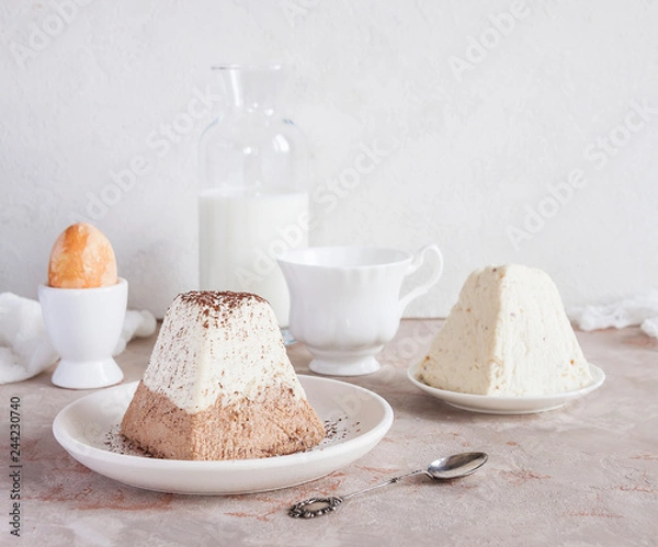 Fototapeta Easter background. Traditional Easter holiday table: cake, Easter and Easter eggs.