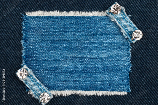 Obraz Denim frame with fringe and two belts with rhinestones.