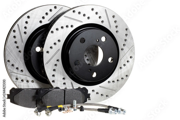 Obraz brake disc, pad and reinforced brake hose on a white background