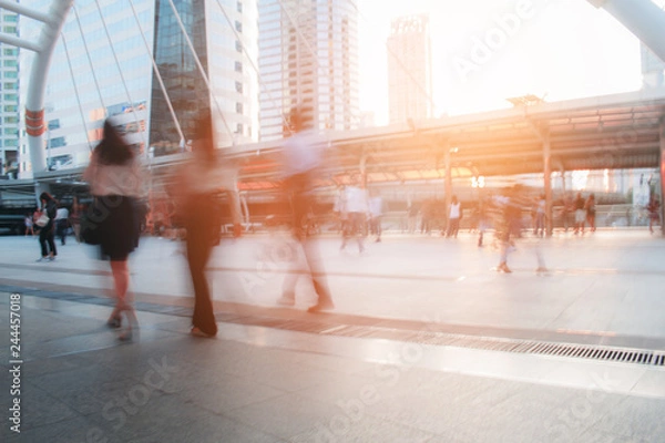 Fototapeta People are busy in city.