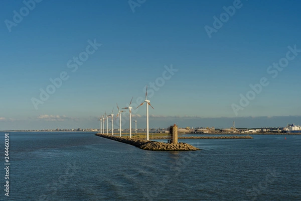 Obraz Wind turbines near a harbor in the industrial area of ​​Zeebrugge