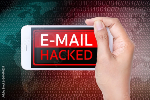 Fototapeta Hand held a smart phone with a screen showing that the email was hacked.