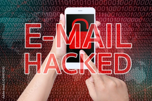 Fototapeta Hand held a smart phone with a screen showing that the email was hacked.