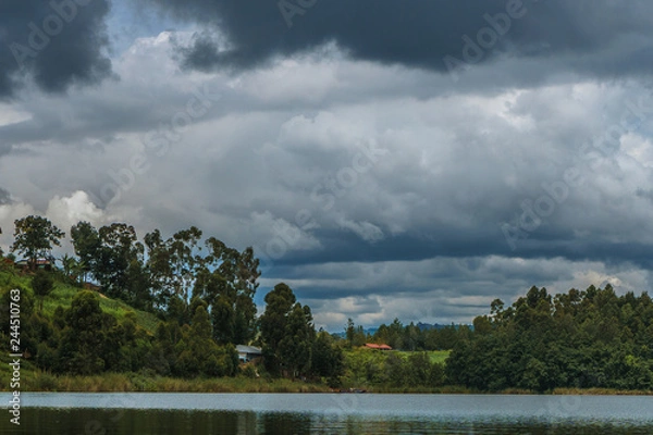 Obraz dark clouds over the Bunyonyi lake in Uganda