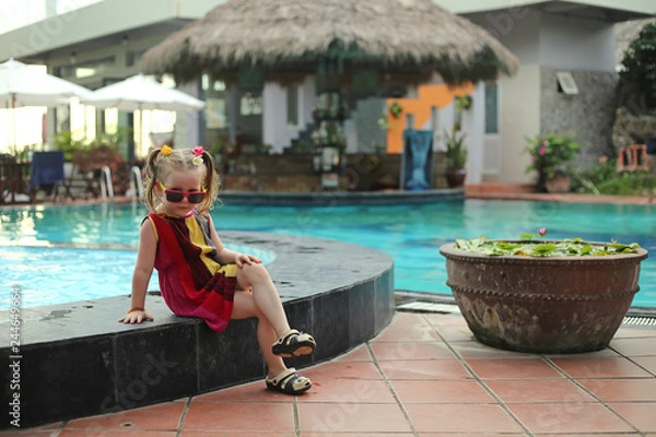 Obraz child by the pool