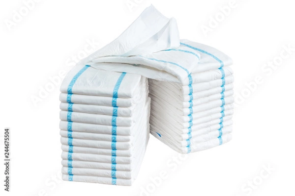 Fototapeta Stacks of adult diapers isolated on white background. Health care for elderly and bedridden people with urinary incontinence