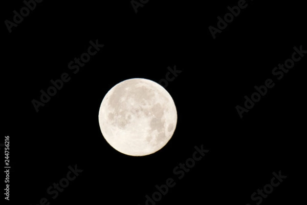Obraz The moon will pass through Earth's shadow 01-23-2019 in the only total lunar eclipse. The Moon is an astronomical body that orbits planet Earth and is Earth's only permanent natural satellite.