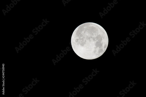 Obraz The moon will pass through Earth's shadow 01-23-2019 in the only total lunar eclipse. The Moon is an astronomical body that orbits planet Earth and is Earth's only permanent natural satellite.