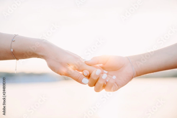 Fototapeta hands of mother and daughter