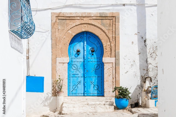 Obraz Traditional door with pattern and tiles, Sidi Bou Said, Africa