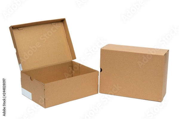 Fototapeta Brown cardboard shoes box with lid for shoe or sneaker product packaging mockup, isolated on white with clipping path.