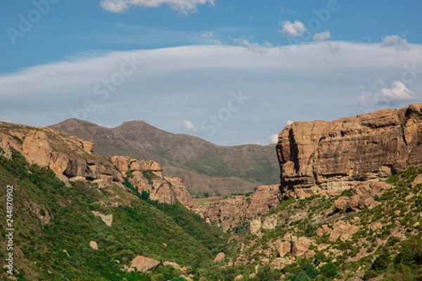 Obraz Landscape of canyon and mountains at Lesotho country in Africa. Blue sky and white clouds in a midday. Kingdom of mountain.