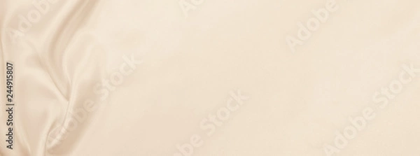 Fototapeta Smooth elegant golden silk or satin luxury cloth texture as wedding background. Luxurious background design. In Sepia toned. Retro style