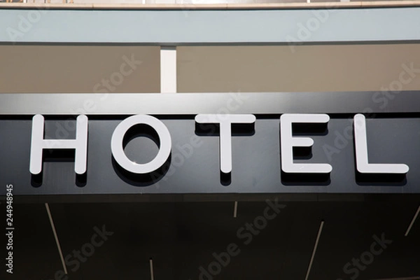 Fototapeta Hotel Sign on Building