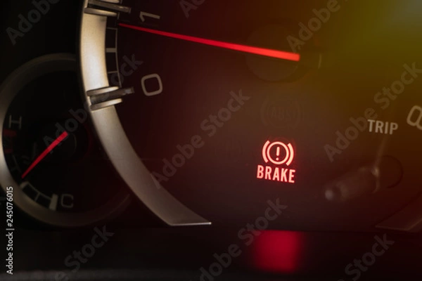 Obraz warning light handbrake in car dashboard