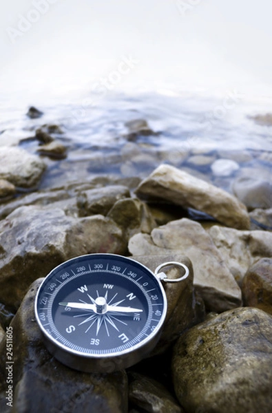 Obraz compass on the shore