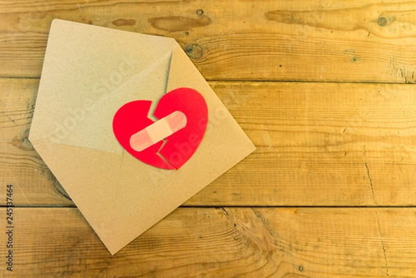 Obraz Red broken heart in an envelope.