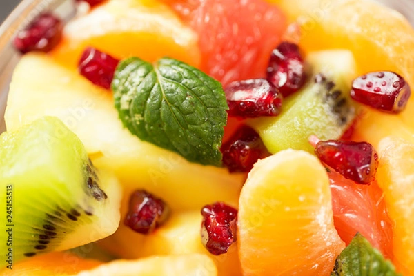 Obraz Healthy fresh fruit salad as a background.