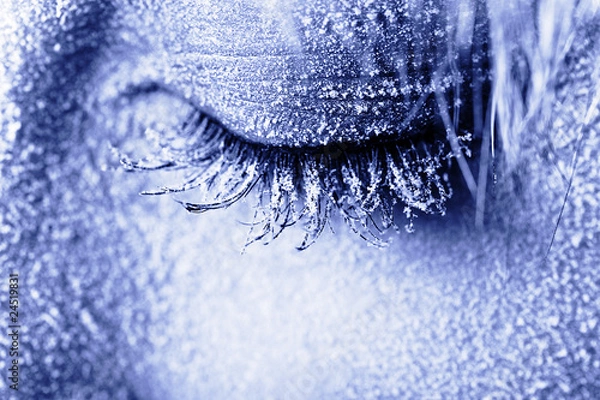 Fototapeta Frozen woman's eye covered in frost