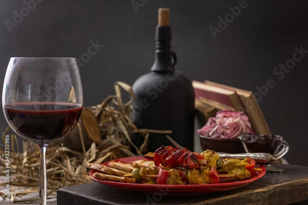 Fototapeta Traditional dinner in a country house. Meat with vegetables and bread. Hearty and tasty dish.Menu background for cafe and restaurant. Place for text.