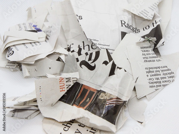 Obraz torn and crumpled newspaper