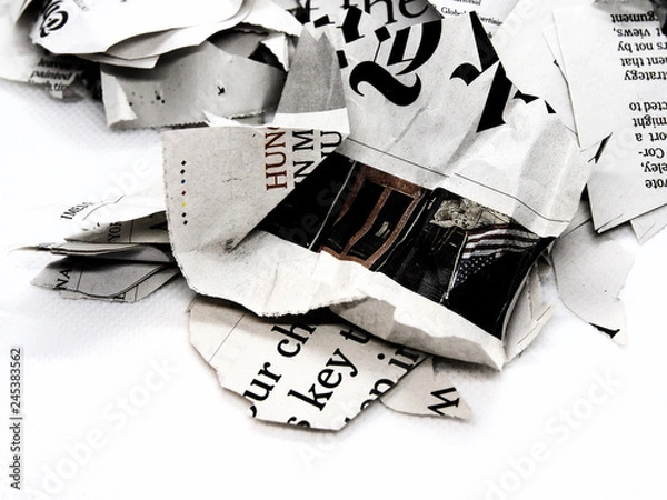 Obraz torn and crumpled newspaper