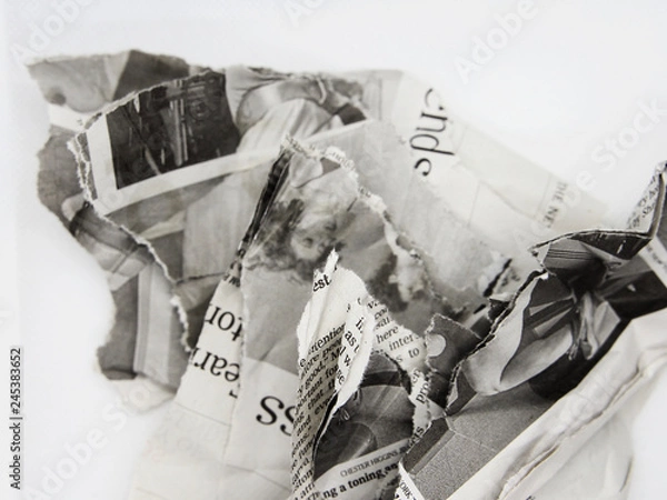 Obraz torn and crumpled newspaper