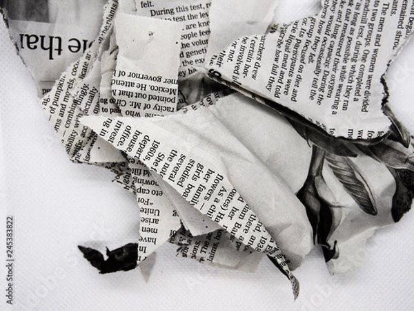 Obraz torn and crumpled newspaper