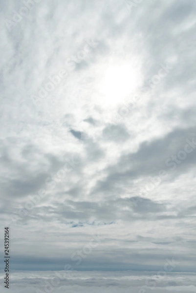 Obraz Blue sky background, viewed from an airplane window.