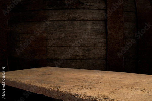Fototapeta background barrel and worn old table of wood