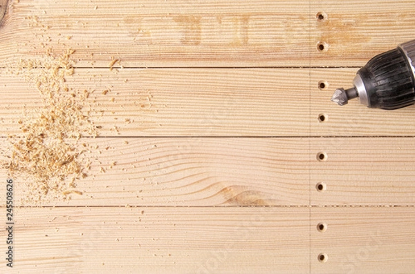 Fototapeta countersink bit in the drill holes machined countersink in wooden workpieces