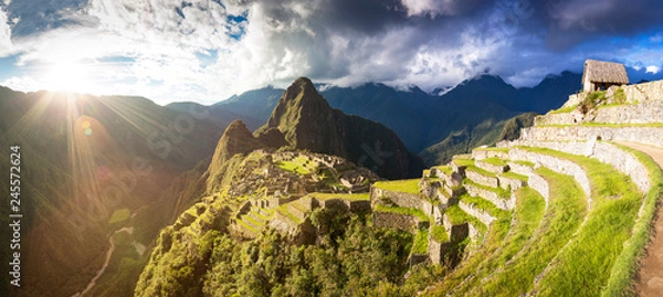 Fototapeta Panoramic view of sunset over Machu Picchu, Peru