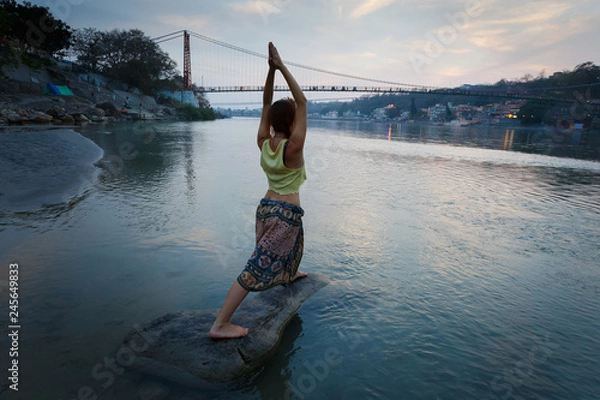 Obraz Woman make yoga pose rishikesh.
