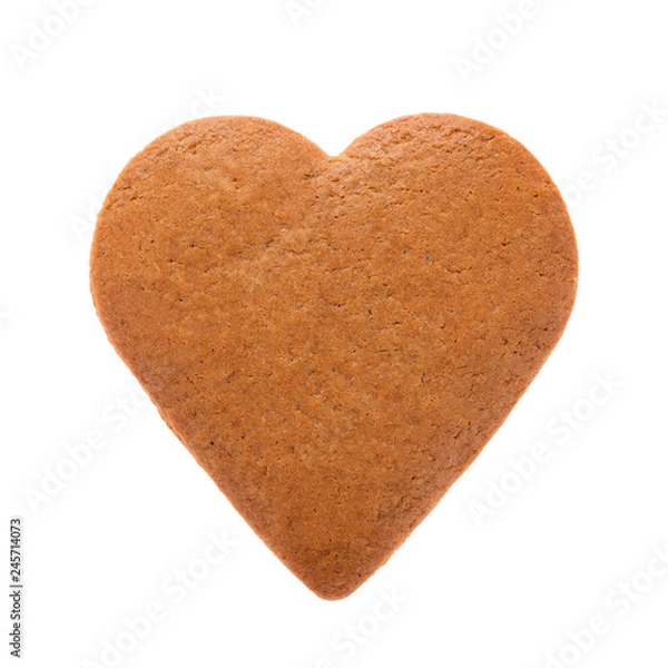 Fototapeta Baked gingerbread from shortbread in the form of a heart. Isolated on white background. Attribute of Valentine's Day