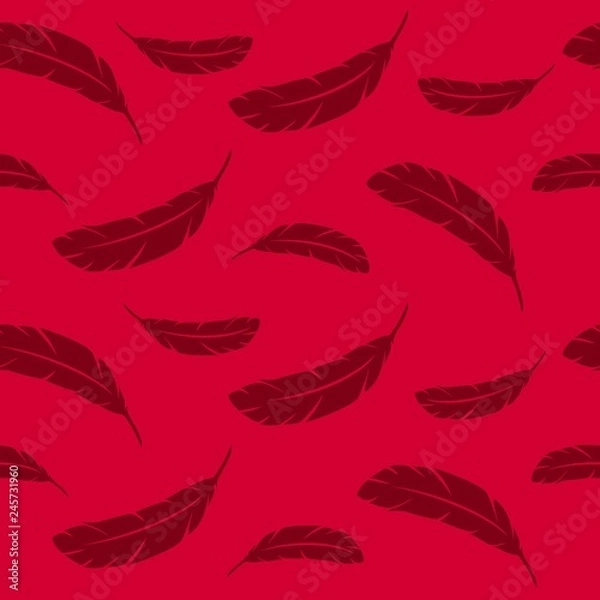 Fototapeta  Feathers of birds in flight. Feather seamless pattern on red background.
