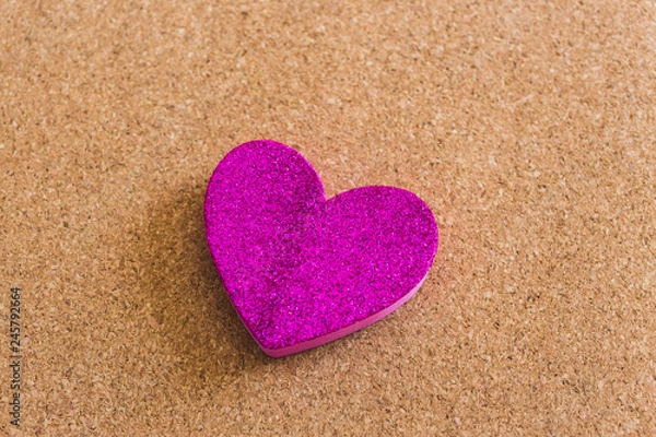 Obraz Top view of a velvet heart shape over a craft background