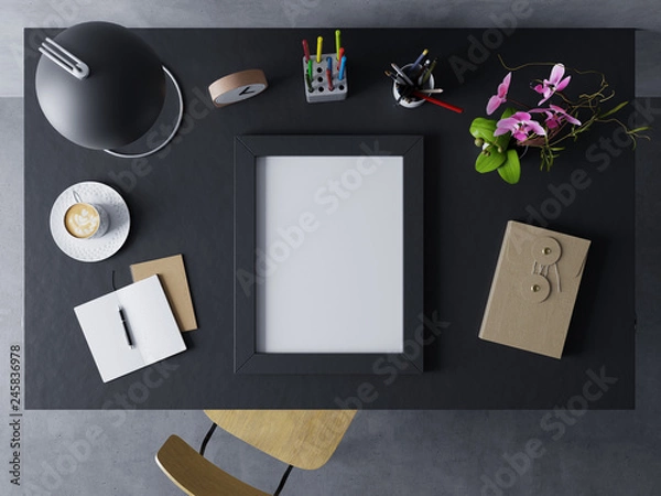 Fototapeta 3d mock up design template to showcase design of blank poster in modern workspace in horizontal black frame resting on a polished glossy table in straight top view