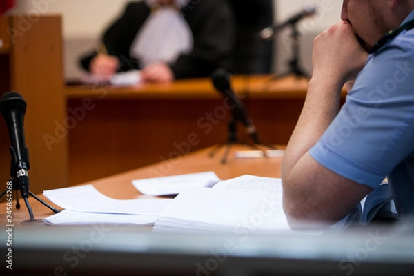 Fototapeta Lawyers listening to the judge in the court room