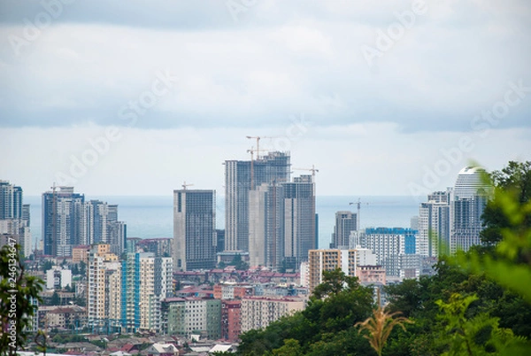 Fototapeta Panoramic view of the construction of houses on the coast.