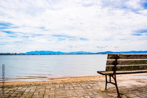 Obraz empty bench on the beach