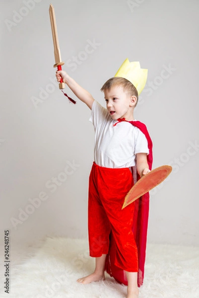 Obraz child in knight costume with crown